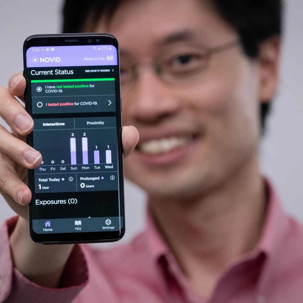 Po-Shen Loh with NOVID app for COVID-19 pandemic control.