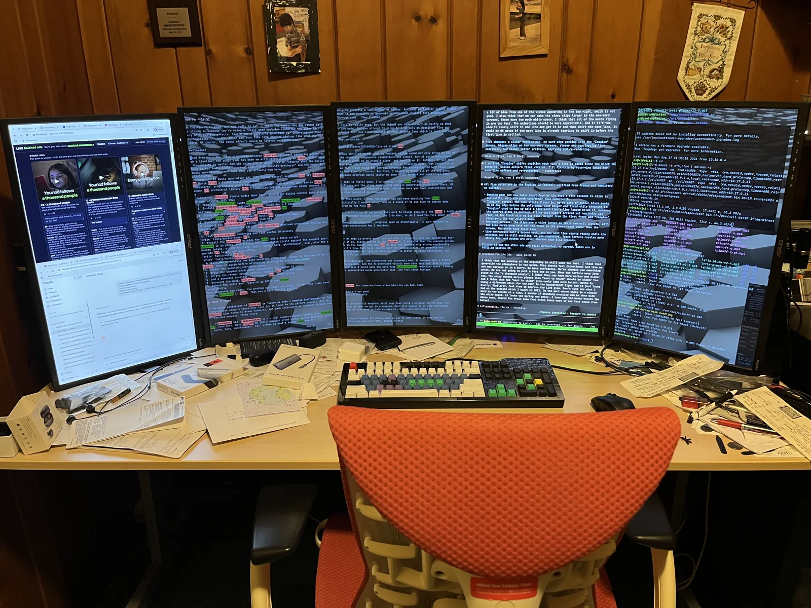A Linux workstation with five monitors stacked vertically